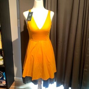 Halara strapped back fit and flare active dress. NWT. No shorts.